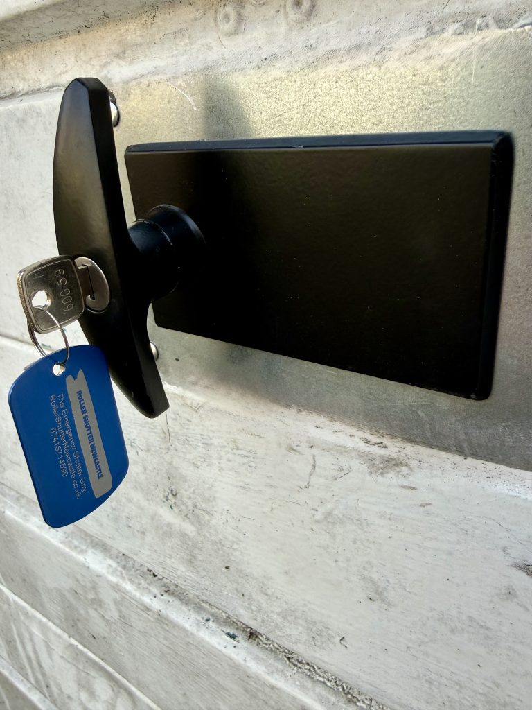 Garage door lock upgrade in Heaton NE7 with new black handle fitted to Garador Mk1 up and over garage door