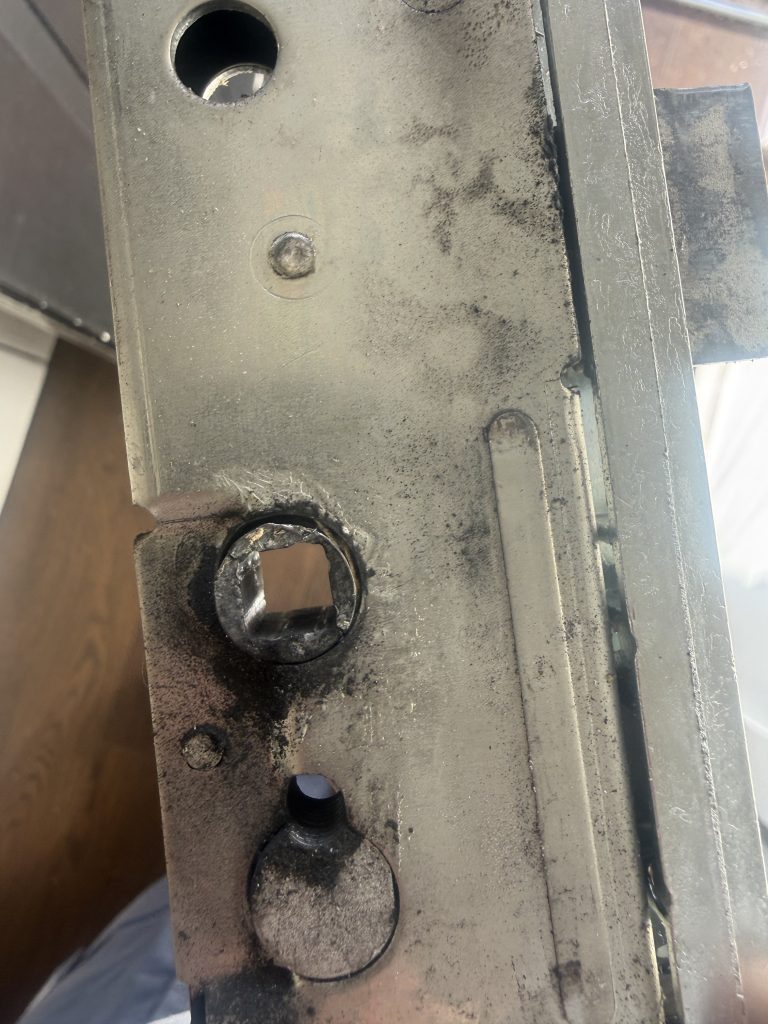 Cracked spindle follower inside Lockmaster multipoint lock gearbox from composite door repair in West Allotments NE27.