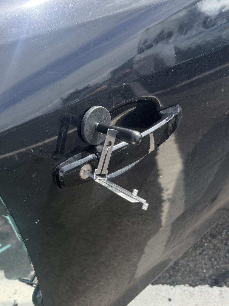 Non-destructive vehicle entry on Vauxhall during all keys lost locksmith job in Whitley Bay