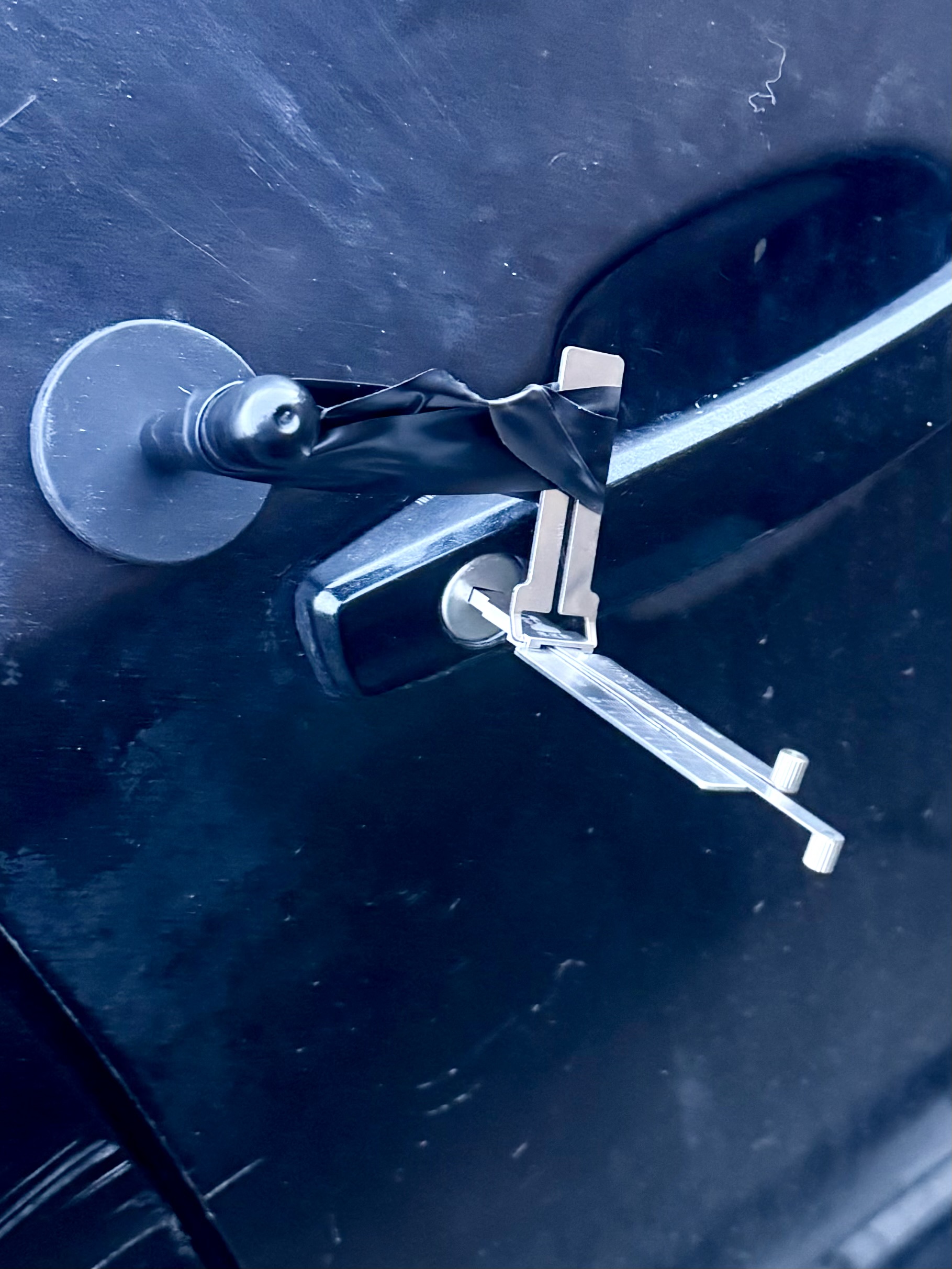 Lishi decoder held inside a Vauxhall Astra door lock during non-destructive entry and key generation in Lynemouth near Ashington